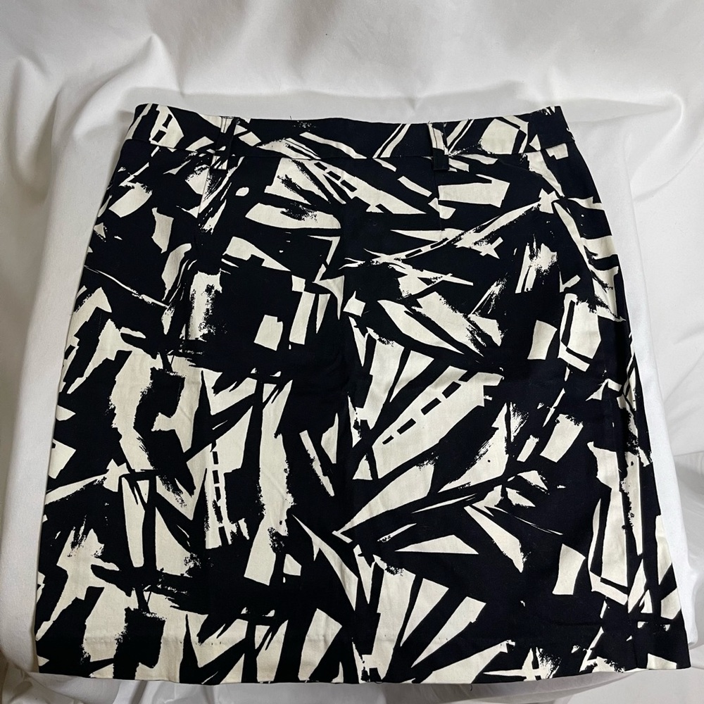 Black and off white, abstract print, knee length skirt.